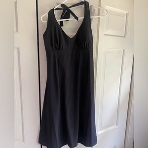 Athleta black athletic dress. New with tags. Zipper pockets.
